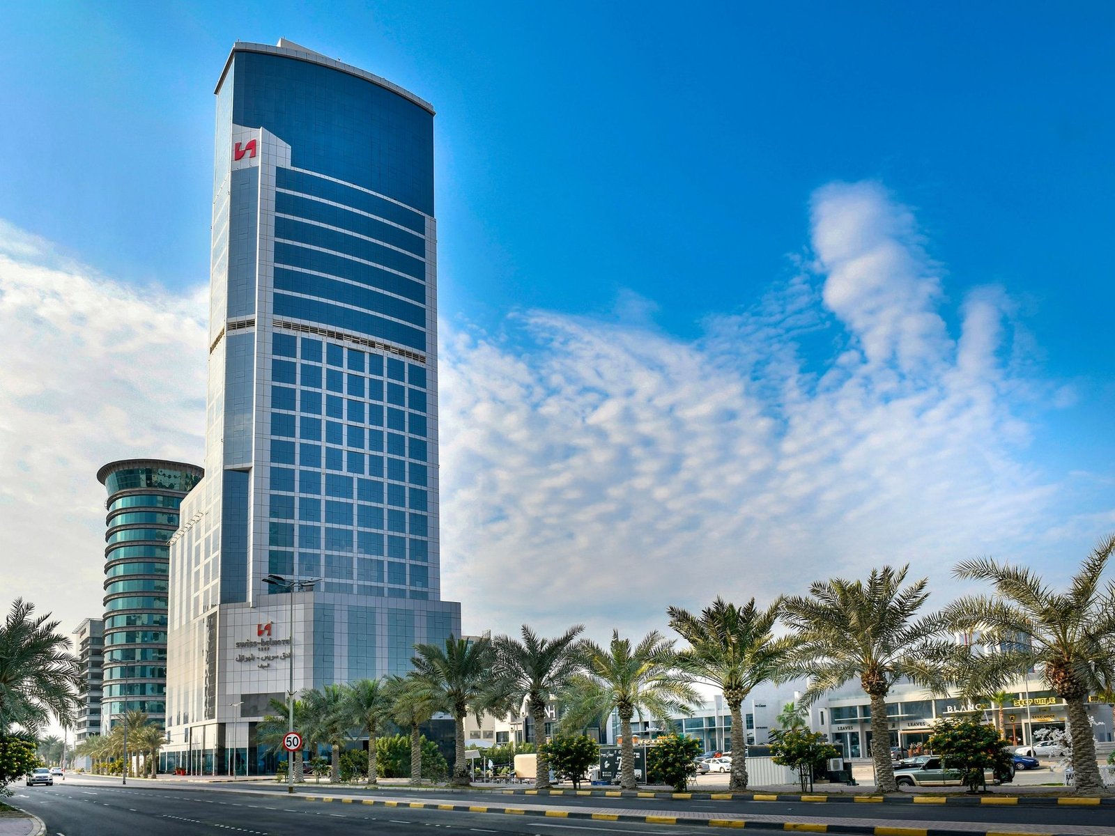 Modern hotel lobby with warm lighting and seating